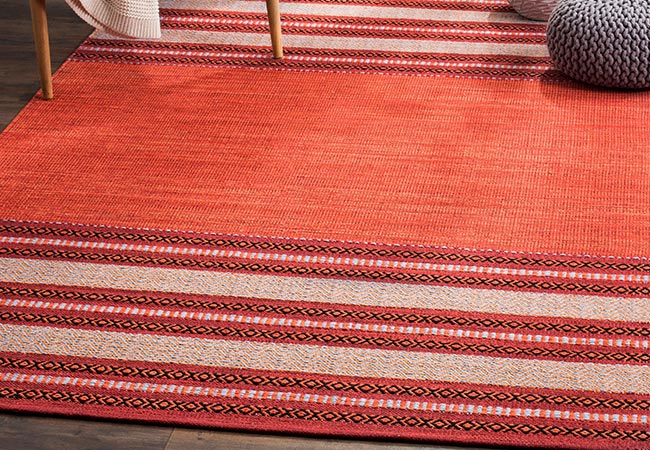 flatewave cotton area rug cleaning on wood floor